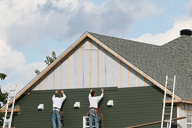 Professional Siding Contractor technician working in Central City, IL